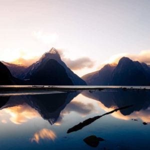 Milford Sound Piopiotahi fiord fiordland nz nouvelle zélande new zealand mountain tasman sea mitre peak water reflect reflet sunset coucher de soleil blue Symétrie nature calm relax